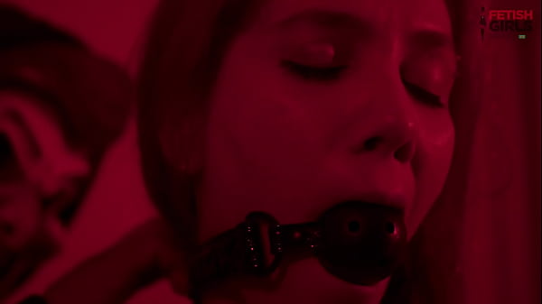 The Enigmatic and two Latin submissive girls, a busty blonde and a redhead with a big ass
