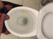 Pissing in toilet