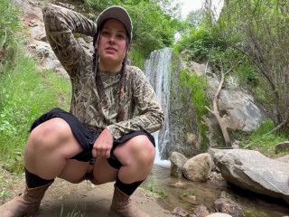Pissing in a waterfall