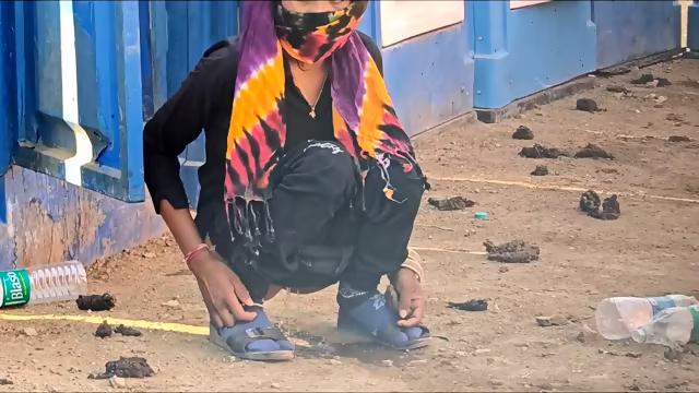 hurny Indian girl peeing outside the toilet room