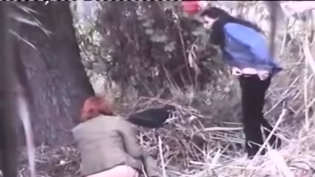 Pissing girls in the forest burned in front of the camera