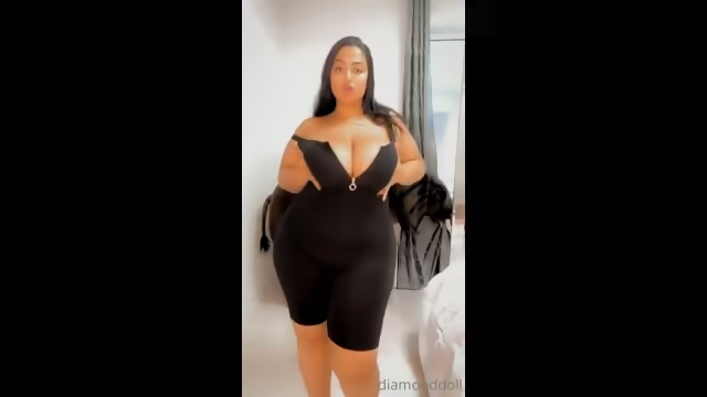 Thick D 67 in a black dress
